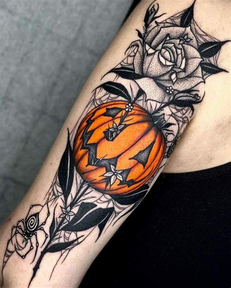 50 magical Halloween tattoos. We've collected 50 awesome Halloween tattoos for you. There will be no standard horror tattoos, but only those motives for which everyone loves this holiday so much: bright pumpkins, mysterious ghosts and charming witches. Choose the style and idea that you liked the most, and go to the artist's page to see his ...